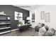 Study room with desk, decorative shelves, and comfortable seating, ideal for productivity at 130 Parker Claire Ln, Kings Mountain, NC 28086