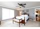 Well-lit bedroom featuring neutral walls and a decorative wood-frame bed at 1371 Hawks Nest Rd, York, SC 29745