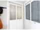 Elegant closet doors with decorative glass panels and white trim, adding a touch of sophistication at 1371 Hawks Nest Rd, York, SC 29745