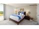 Comfortable bedroom with a soft bed, window, and stylish decor, creating a relaxing space at 138 Rustling Waters Dr, Mooresville, NC 28117