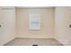 Bright bedroom with a window offering natural light, complemented by neutral walls and carpet at 150 Parker Claire Ln, Kings Mountain, NC 28086