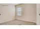 Well-lit bedroom showcases a window with blinds, neutral walls, and comfortable carpeting at 150 Parker Claire Ln, Kings Mountain, NC 28086