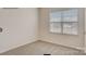 Bright bedroom has soft carpet, neutral walls, and ample light from a window at 150 Parker Claire Ln, Kings Mountain, NC 28086