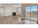Spacious living room with hardwood floors, fireplace, and sliding glass door at 150 Parker Claire Ln, Kings Mountain, NC 28086