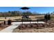 Community playground with slides, benches, and shade, for outdoor recreation at 150 Parker Claire Ln, Kings Mountain, NC 28086