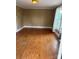 Spacious living room featuring hardwood floors and natural lighting at 1510 Stoker Ter, Albemarle, NC 28001