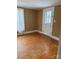 Cozy living room showcasing beautiful hardwood floors at 1510 Stoker Ter, Albemarle, NC 28001
