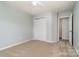 Bedroom featuring a closet and door leading to a connected room, providing functional living space at 152 Hampshire Dr, Mooresville, NC 28115