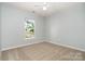 Bedroom with window view, showcasing an inviting space filled with natural light, enhancing comfort at 152 Hampshire Dr, Mooresville, NC 28115