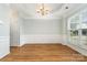 Traditional dining room with wood floors, chair rail, and chandelier at 152 Hampshire Dr, Mooresville, NC 28115