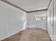 Bedroom with single window and space for furniture arrangements at 1613 Hamilton St, Charlotte, NC 28206