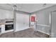 Cozy kitchen area with essential appliances and wooden floor at 1613 Hamilton St, Charlotte, NC 28206