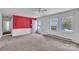 Spacious living area with natural light and an exterior door at 1613 Hamilton St, Charlotte, NC 28206