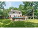 Spacious backyard featuring a deck and above-ground pool at 1739 Lesa Lin Dr, Monroe, NC 28112