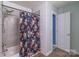 Bathroom featuring shower with floral shower curtain, and wood look vinyl floors at 1739 Lesa Lin Dr, Monroe, NC 28112
