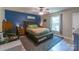 Comfortable bedroom with a large window, ceiling fan, and calming decor at 1739 Lesa Lin Dr, Monroe, NC 28112