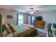 Bedroom featuring natural light, a ceiling fan, and wooden dresser at 1739 Lesa Lin Dr, Monroe, NC 28112
