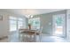 Inviting dining area features a stylish light fixture, lots of natural light and access to the backyard at 1739 Lesa Lin Dr, Monroe, NC 28112
