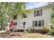 Two-story home featuring a porch and well-maintained landscaping at 1739 Lesa Lin Dr, Monroe, NC 28112