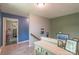 Upstairs hallway with a console table and framed pictures at 1739 Lesa Lin Dr, Monroe, NC 28112