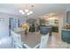 Open kitchen and dining area features granite countertops, stainless appliances and a functional center island at 1739 Lesa Lin Dr, Monroe, NC 28112