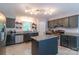 Kitchen with grey cabinets, stainless steel appliances, and granite countertops at 1739 Lesa Lin Dr, Monroe, NC 28112