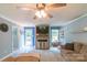 Inviting living room with a fireplace and TV, backyard access and a comfortable sectional sofa at 1739 Lesa Lin Dr, Monroe, NC 28112