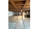 Unfinished basement area with visible utilities and support beams, offering potential for customization at 1821 Beaman St, Shelby, NC 28152