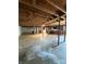 Spacious unfinished basement with exposed ceiling joists, offering ample room for future renovation projects at 1821 Beaman St, Shelby, NC 28152