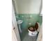Small bathroom with vintage mint green tile, toilet and pedestal sink at 1821 Beaman St, Shelby, NC 28152
