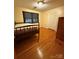 Bedroom with hardwood floors, a bed, a window, and a closet with folding doors at 1821 Beaman St, Shelby, NC 28152