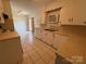 Functional kitchen with white cabinets, tile flooring, and modern appliances ready for cooking and meal prep at 1821 Beaman St, Shelby, NC 28152