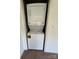 White stacked washer and dryer unit inside laundry closet at 1821 Beaman St, Shelby, NC 28152