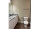 Bathroom featuring double sink vanity with granite countertop and stainless steel fixtures at 183 Pine Haven Rd, Statesville, NC 28677