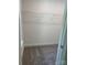 Walk-in closet with gray carpet and wire shelving for optimal storage and organization at 183 Pine Haven Rd, Statesville, NC 28677