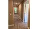 A wide hallway with neutral walls and carpeted floor at 183 Pine Haven Rd, Statesville, NC 28677