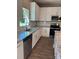 Modern kitchen featuring granite countertops, stainless steel appliances, and white cabinetry at 183 Pine Haven Rd, Statesville, NC 28677