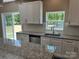 Kitchen featuring stainless steel appliances, granite countertops, and hardwood floors at 183 Pine Haven Rd, Statesville, NC 28677