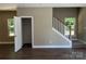 Living room with a closet and view of the staircase at 183 Pine Haven Rd, Statesville, NC 28677