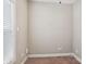 Neutral-carpeted bedroom with a window; ideal for relaxation at 2021 Chantilly Ln, Salisbury, NC 28146