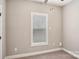 Bedroom with a window and neutral carpeting; great natural light at 2021 Chantilly Ln, Salisbury, NC 28146