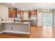 Kitchen with stainless appliances, granite counters, and ample cabinet space, seamlessly connected to dining at 2021 Chantilly Ln, Salisbury, NC 28146
