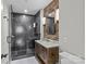 Modern bathroom featuring a walk-in shower and a vanity with stone countertop at 210 N Church St # 2910, Charlotte, NC 28202