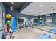 Gym featuring exercise equipment, weights and wall mirror at 210 N Church St # 2910, Charlotte, NC 28202