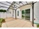This backyard features a sliding glass door and a pergola-covered patio, perfect for enjoying the outdoors at 2169 Shady Pond Dr, Clover, SC 29710