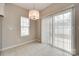 Bright dining area with sliding glass doors leading to the backyard patio at 2169 Shady Pond Dr, Clover, SC 29710