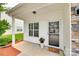 Close up of a cozy, inviting front porch with decorative accents at 2169 Shady Pond Dr, Clover, SC 29710
