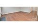 Spacious living room with gleaming hardwood floors and ample natural light at 2169 Shady Pond Dr, Clover, SC 29710