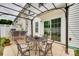 A charming outdoor patio with a pergola and comfortable seating for outdoor dining at 2169 Shady Pond Dr, Clover, SC 29710