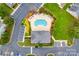 Aerial view of the community pool with lounge chairs and manicured landscaping offers a resort-like experience at 2169 Shady Pond Dr, Clover, SC 29710